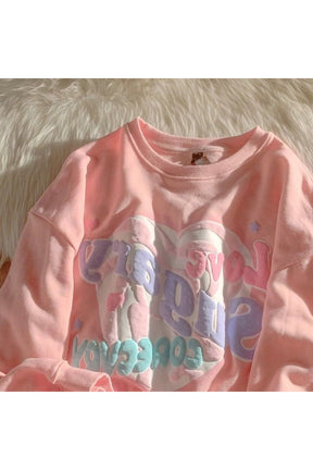 Rahat ve stil sahibi Dreamcore tarzı sweatshirt.