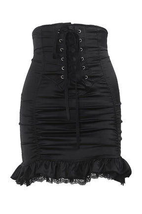 Siyah, vücuda oturan Gotik tarzı bodycon etek.