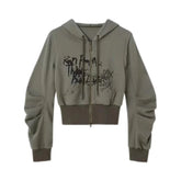 Grunge tarzıyla tasarlanmış kısa fermuarlı hoodie.
