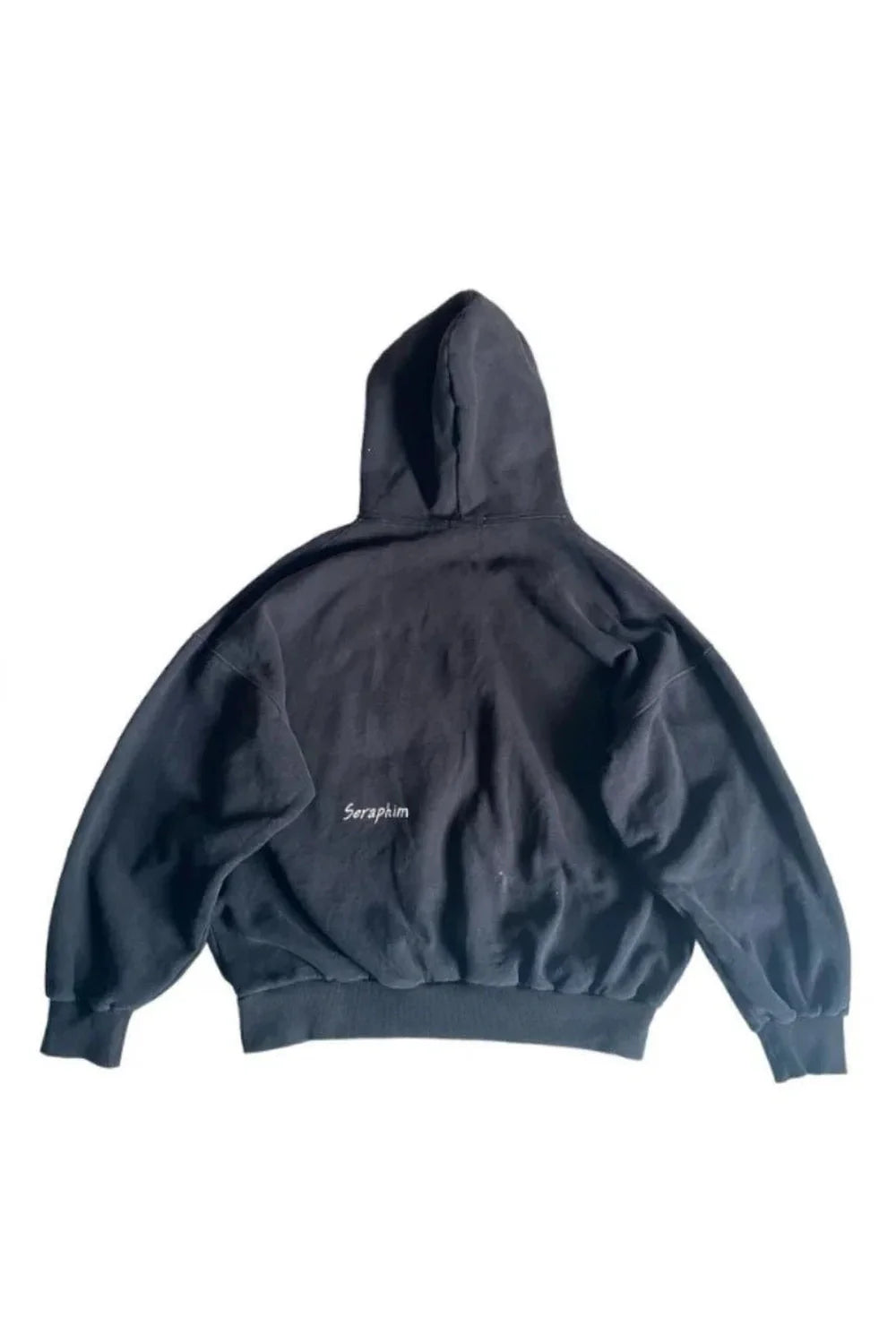 Sonbaharın gizemini yansıtan göz nakışlı hoodie.