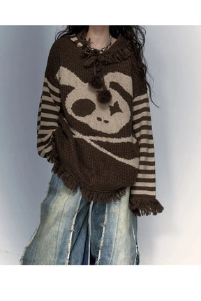 Sevimli Panda desenli, punk tarzı püsküllü kazak.