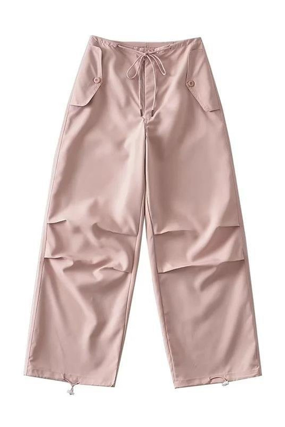 Pembe paraşüt jogger pantolon, rahat ve şık görünüm.