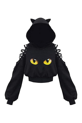 Sonbahar cadı tarzını yansıtan uzun kollu crop hoodie.